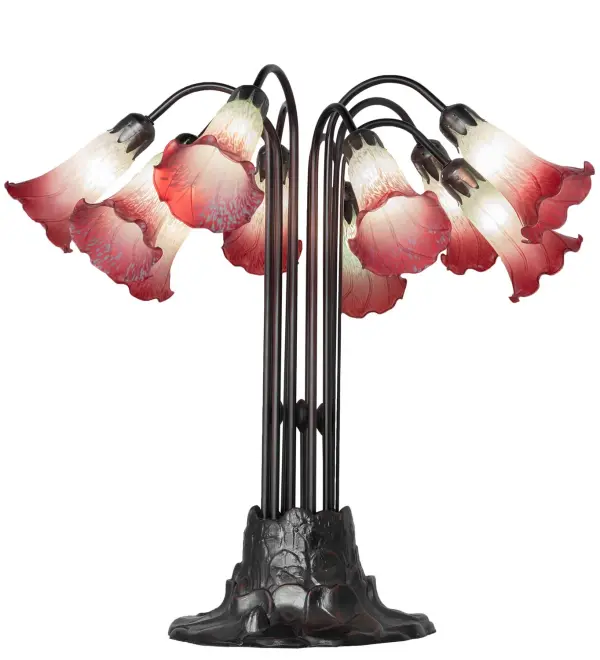 One of the most popular Louis Comfort Tiffany styled lamps on the market today, recreating his famous Favrile design from the early 1900's. This softly mottled Petal Pink shaded Ten Light Table Lamp offers an attractive, delicate design featuring shades mouth blown of fine art glass. Lily shades are suspended from stems delicately winding above a Lily pad base finished by hand in Mahogany Bronze. Collection: Seafoam/Cranberry Finish: Mahogany Bronze Glass: Seafoam/Cranberry Width: 25.00" Height: 24.00" Length: 25.00" Weight: 16.00 lb Number of Bulbs: 10 Maximum Wattage: 25.00 W Bulb Type: B10 Bulb Base: E12 Material: Steel Country of Origin: CHINA Safety Rating: Dry