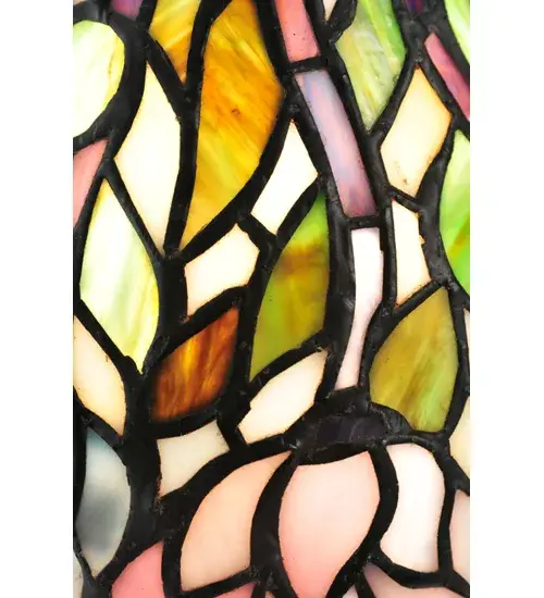 Stylized Wisteria flower clusters in Petal Pink; Sky Blue and Dark Mauve with Jade Green leaves and Dark Mauve vines drape over this Beige shade. The classic styling of this Tiffany inspired art glass and soft pastel colors will add charm to any room. The stunning mini lamp is made of hand cut glass using the famous Meyda Tiffany copperfoil construction process. UL and cUL listed for dry locations. Each piece is a unique work of art with color variations based on natural ingredients inherent in the glass. Contact us if color matching is critical when ordering multiple items. - alternate view