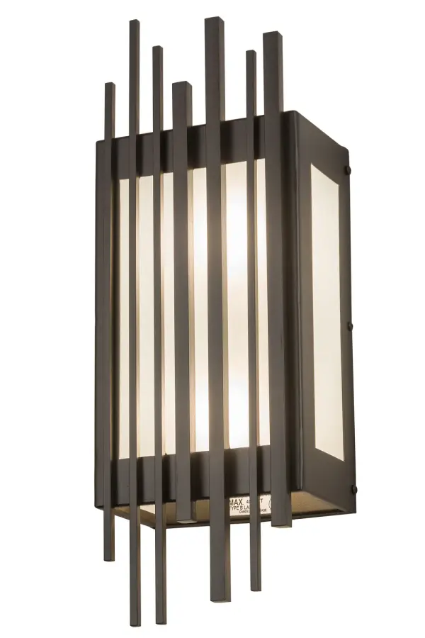 Breaking all the rules of traditional design and standing upright behind bars is this geometric styled wall sconce for today's interiors. Beautiful ambient illumination is released through a Clear Frosted Glass diffuser while the hardware is offered in a Bronze finish. Handmade in the USA, this fixture is available in custom finishes, sizes and styles. Dimmable energy efficient lamping options such as LED are offered. The sconce is UL and cUL listed for dry and damp locations. Collection: Bars&Grill Finish: Bronze Glass: Frosted Clear Glass Width: 7.00" Height: 19.50" Length: 5.00" Weight: 9.50 lb Extension from Wall: 5.00" Number of Bulbs: 2 Maximum Wattage: 40.00 W Bulb Type: BA10 Bulb Base: E12 Material: Steel Country of Origin: USA Safety Listing: Damp Safety Rating: Damp