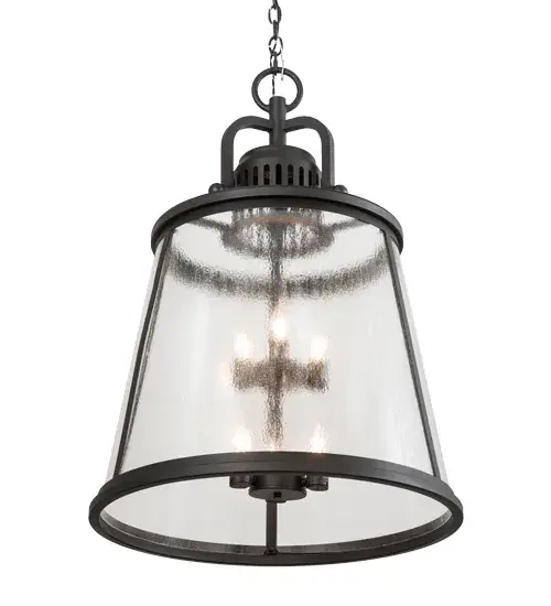 The classic upscale Steadman Lantern is designed with a rugged frame, architectural detailing and brilliant elegance. The tapered Clear Seeded Glass shade reveals two faux candelabras with complementary Candle Covers equipped with Customer Supplied Medium base lamps that match the Old Wrought Iron finish of the custom crafted accents, frame and hardware. Designed with high-style appeal, the charming fixture is used for beautiful ambient lighting in corridors, porches, entryways and other residential and commercial spaces. Custom designs, sizes and finishes are available, as well as dimmable energy efficient lamping options such as LED. The 26-inch wide pendant is UL and cUL listed for dry and damp locations. Collection: Steadman Finish: Old Wrought Iron Glass: Clear Seeded Glass Width: 26.00" Height: 41.00" Length: 26.00" Weight: 43.00 lb Number of Bulbs: 6 Maximum Wattage: 60.00 W Bulb Type: A19 Bulb Base: E26 Material: Steel Country of Origin: USA Safety Listing: Damp Safety Rating: Damp - alternate view