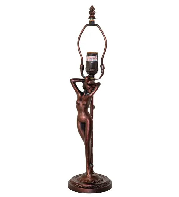 Elegant and stunning. This classic table lamp base features a traditional nude lady statuette and is finished in warm, hand-applied Mahogany Bronze. The Shy Nude Table Base is included in our American- designed, handcrafted Traditional Decorative Lamp Base Collection. The base is UL and cUL listed for dry locations. Collection: Shy Nude Finish: Mahogany Bronze Width: 4.75" Height: 12.00" Length: 4.75" Weight: 4.00 lb Number of Bulbs: 1 Maximum Wattage: 60.00 W Bulb Type: A19 Bulb Base: E26 Material: Zinc Country of Origin: CHINA Safety Rating: Dry