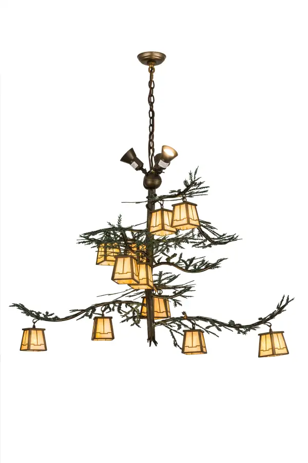 Like a guardian of the forest stretching towards the heavens, noble Pine Tree metal branches burgeon with handpainted Green needles that wheedle their bouquet from its strong metal tree trunk. Invite the natural charm of the American woodlands to create a dramatic design statement in a camp, lodge, home, cabin or business with this astonishing chandelier.Beautiful ambient light radiates from 12 stunning Beige Iridescent art glass lanterns revealing an abstract Arts & Crafts style complemented with hardware and decorative accents in an Antique Copper finish. Dramatic uplighting on the ceiling evokes from 3 Customer supplied, Medium Base MR16 Halogen lamps while 12 Medium Base G9 JCD lamps bring out the beauty of the art glass. Made in USA. Collection: Pine Branch Finish: Antique Copper/Green Glass: Beige Iridescent Width: 52.00" Height: 40.00" Length: 52.00" Weight: 31.00 lb Number of Bulbs: 12 Maximum Wattage: 60.00 W Bulb Type: T4 JCD Bulb Base: G9 Material: Steel Country of Origin: USA Safety Listing: Damp Safety Rating: Damp