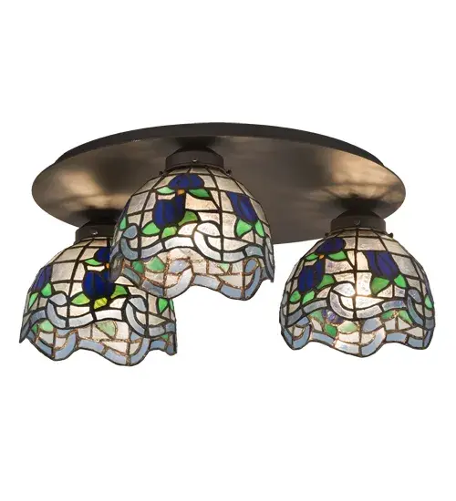 Grace your home with this elegant ceiling fixture featuring a crowned art glass shade. The shade highlights a gridwork of Beige art glass; adorned with a Mauve Waterglass border of swirling ribbons and perfect Red rosebuds accented with Green leaves. The stained glass shade is created with the famous Meyda Tiffany copperfoil construction process and complemented with an ornate cast metal floor base in a Mahogany Bronze finish. This lighting design is inspired by famous rose gardens in the New York Botanical Garden in Bronx Park; New York City; to the White House in Washington; D.C. It is ideal for placement in residential and hospitality spaces to create a beautiful design statement. The Roseborder Flushmount is featured in our American-designed; handcrafted Stained Glass Lighting Collection. UL & cUL listed for dry and damp locations. Each shade is a unique work of art with color variations based on natural ingredients inherent in the glass. - alternate view