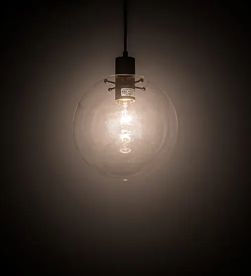 Designed with a round profile; this attractive ceiling fixture defines a distinctive industrial aesthetic. Within the Crystal Idalight orb; the lens reveals an Edison-styled bulb that provides ambient illumination and is complemented with hardware featured in a Textured Black finish. The overall height of the pendant ranges from 14.5 to 109.5 inches; as the cord can be easily adjusted in the field to meet your lighting requirements. The pendant is ideal for installing above bars; counters; and dining tables in residential and hospitality locations from Cleveland; Ohio; to Aurora; Colorado; to Sioux Falls; South Dakota. The Bola Pendant is included in our American-made; American-designed; handcrafted Modern Collection and manufactured in Yorkville; New York. UL and cUL listed for dry and damp locations.