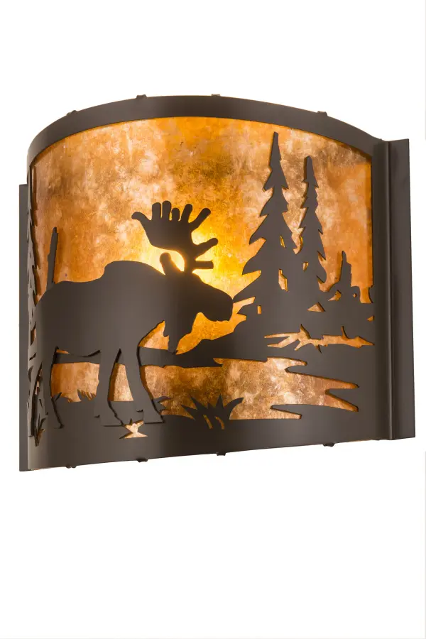 The majestic Moose wanders near a woodland lake as the morning sun rises in the background. This wildlife inspired wall sconce provides ambient lighting through an Amber Mica diffuser. The shade is complemented with Timeless Bronze finished frame and hardware. The curvaceous wall fixture is handmade by highly skilled artisans in our 180;000 square foot manufacturing facility at the foothills of New York's glorious Adirondack Mountains. Other wildlife styles offered. Various finishes and sizes are available. UL and cUL listed for dry and damp locations.