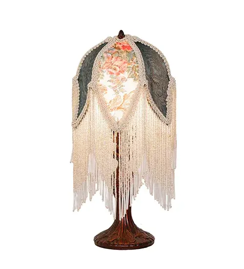 Hunter Green; Ivory; and Pink floral damask fabrics are accented with a Warm Ivory Trim; which is edged in long White Glass beaded trim. This Victorian-inspired; intricately detailed shade is combined with a beautifully detailed cast metal lamp base in a hand-applied Mahogany Bronze finish. The lamp is ideal as a lighted accent piece on a living room end table; dining room credenza; or bedroom nightstand. This lighting design is inspired by beautiful fabrics and fashion from New York; to Chicago; Illinois; and Los Angeles; California. The Fabric & Fringe Roses Accent Lamp is featured in our American-made; handcrafted Fabric & Fringe Collection. UL and cUL listed for dry locations. - alternate view