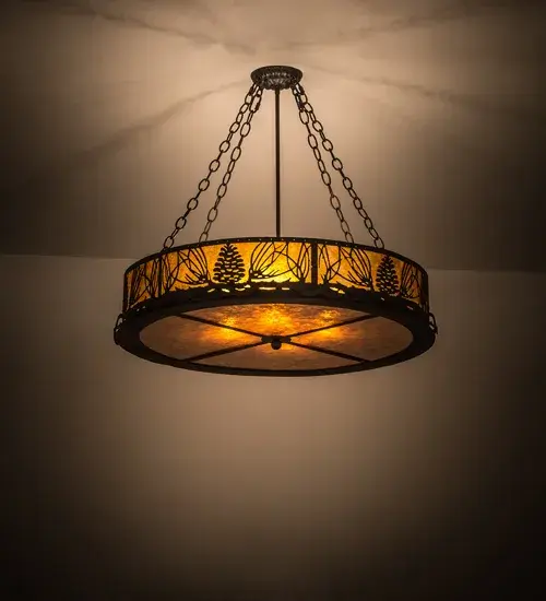 Mother nature comes to light as Mountain Pinecones and Pine Needles are featured on this unique nature inspired ceiling fixture. The charm of the forest comes alive with soft ambient light emanating through an Amber Mica diffuser. The shade is highlighted with accents featured in a bold Black finish. The ceiling fixture is perfect for dining areas; entryways; living spaces and other rooms where you want to make a stunning design statement. Handcrafted in our 180;000 square foot manufacturing facility in Yorkville; New York. Shade colors; metal finishes and fixture sizes can be customized to your needs. UL and cUL listed for dry and damp locations.