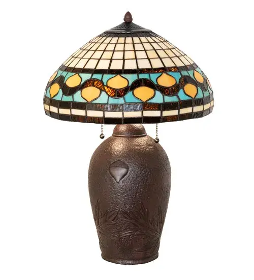 Tiffany-inspired Golden Acorns dance playfully in a ring around these geometric grid-patterned shades in Autumn Harvest Honey; Rust; and Olive Green. The stained glass shade is created using the famous Meyda Tiffany copperfoil construction technique. The handsome acorn and oak leaf lamp cast metal base is hand finished in Warm Mahogany Bronze. The lamp is ideal as an illuminating accent piece on credenzas; occasional tables; nightstands; and other spaces in residential and hospitality settings. Inspired by Oak Tree forests throughout the US; from Raleigh; North Carolina; to Conway; South Carolina; to Thousand Oaks; California. The Tiffany Acorn Table Lamp is featured in our American designed; handcrafted Tiffany Reproduction Collection. UL and cUL listed for dry locations. - alternate view