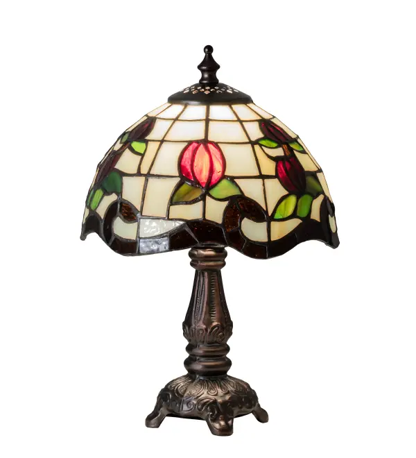 Grace your home with this elegant shade, featuring a gridwork of Bone Beige glass, adorned with a Rootbeer granite border of swirling ribbons and perfect Burgundy rosebuds. The Tiffany style stained mini lamp is made of hand cut and copperfoiled glass and is paired with a Mahogany Bronze, hand finished lamp base. Collection: Roseborder Finish: Mahogany Bronze Glass: Stained Glass Width: 7.50" Height: 11.50" Length: 7.50" Weight: 2.50 lb Number of Bulbs: 1 Maximum Wattage: 60.00 W Bulb Type: BA9 Bulb Base: E12 Material: Zinc Country of Origin: CHINA Safety Listing: Dry Safety Rating: Dry