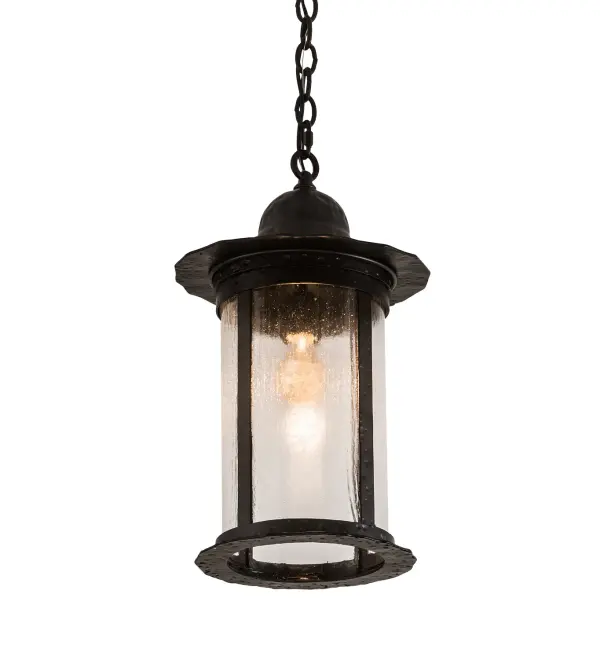 Evoking Craftsman styling with a minimalist design, the Cimelio pendant features a cylindrically shaped lantern that projects beautiful ambient light through high fired, kiln formed Clear Seeded Glass while revealing a customer supplied medium base lamp. Intriguing curves are combined with a straight line motif on a Hand Hammered Iron frame and hardware featured in a stunning Solar Black finish. The overall height of this pendant ranges from 24 to 74 inches as the chain length can be easily adjusted in the field to accommodate your specific application needs. Handmade in our 180,000 square foot manufacturing facility in Yorkville, NY. Custom designs, styles, sizes and dimmable energy efficient lamping options available. UL and cUL listed. Collection: Cimelio Finish: Solar Black Glass: Clear Seeded Glass Width: 12.00" Height: 24.00" Length: 12.00" Weight: 17.00 lb Number of Bulbs: 1 Maximum Wattage: 60.00 W Bulb Type: A19 Bulb Base: E26 Material: Steel Country of Origin: USA Safety Listing: Damp Safety Rating: Damp