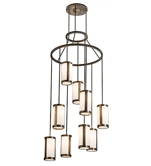 Spanning more than 7 feet from top to bottom, this tiered Cartier Cascading chandelier renders an eye-catching transitional look. Nine stunning Ivory Textrene shades are aligned in a staggered formation, suspended from two decorative rings and a canopy while providing ambient light at various levels. All hardware is featured in an Antique Copper finish, while a warm glow evokes stunning decorative Cylindres. Ideal for lobbies, foyers, ballrooms, and large spaces. Handcrafted in our 180,000-square-foot manufacturing facility in Upstate New York. Custom options include special sizes, styles, finishes, and dimmable energy-efficient lamping options such as LED. UL and cUL listed for dry and damp locations. Collection: Cartier Finish: Antique Copper Glass: White Linen Width: 35.00" Height: 90.00" Length: 35.00" Weight: 52.00 lb Number of Bulbs: 9 Maximum Wattage: 60.00 W Bulb Type: A19 Bulb Base: E26 Material: Steel Country of Origin: USA Safety Listing: Dry Safety Rating: Dry - alternate view