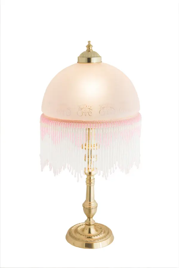 A charming nostalgic accent lamp. This Roussillon Lamp features a stunning Pink Art Glass shade with etched designs that is color coordinated with delicate White and Pink glass beaded fringe. This Victorian-inspired, intricately detailed shade is combined with a beautifully detailed lamp base in a Brass plated finish. Collection: Roussillon Glass: Pink,White Width: 10.00" Height: 21.50" Length: 10.00" Weight: 4.50 lb Number of Bulbs: 1 Maximum Wattage: 60.00 W Bulb Type: A19 Bulb Base: E26 Light Source: LED Color Temperature: 3000 K Material: Brass Country of Origin: CHINA Safety Listing: Dry Safety Rating: Dry LED