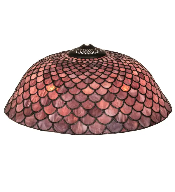 A Louis Comfort Tiffany studio classic... The renowned Fishscale design features a variegated Amber Plum colored art glass; evoking a unique dimensional and textured look. This exquisite art glass shade is created using the famous Meyda Tiffany copperfoil construction technique. The shade pairs well with a base to create a table or floor lamp; and matches with hardware to build a ceiling or wall fixture. The Tiffany Fishscale Shade is featured in our American designed; handcrafted Tiffany Reproduction Stained Glass Lighting Collection. This is a custom item. Please call for availability.