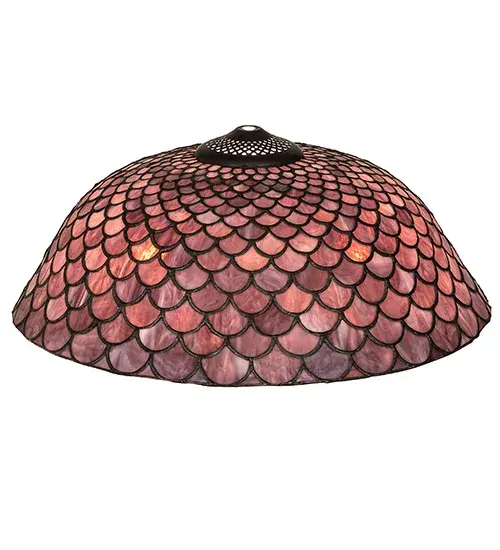 A Louis Comfort Tiffany studio classic... The renowned Fishscale design features a variegated Amber Plum colored art glass; evoking a unique dimensional and textured look. This exquisite art glass shade is created using the famous Meyda Tiffany copperfoil construction technique. The shade pairs well with a base to create a table or floor lamp; and matches with hardware to build a ceiling or wall fixture. The Tiffany Fishscale Shade is featured in our American designed; handcrafted Tiffany Reproduction Stained Glass Lighting Collection. This is a custom item. Please call for availability. - alternate view