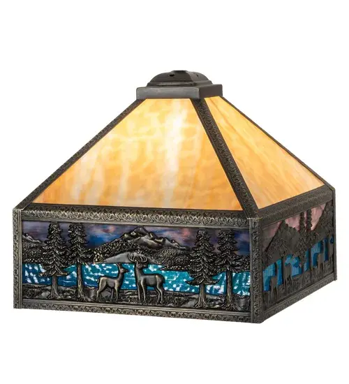 This magnificent stained glass shade is designed to pair with a matching base to illuminate nearly any interior decor. This Beige crown features a Brass frame with a Hi-Lited Craftsman Brown finish. The dramatic shade design highlights Deer meandering near a Blue-Green art glass lake beneath a Blurple art glass sky. The shade is paired with the base; model 19496; to create the table lamp; model 19632. The Deer Lodge Shade is included in our American-made; American-designed; handcrafted Nature-Inspired Stained Glass Collection; manufactured in Yorkville; New York. Each shade is a unique work of art; with color variations arising from natural ingredients inherent in the glass. - alternate view
