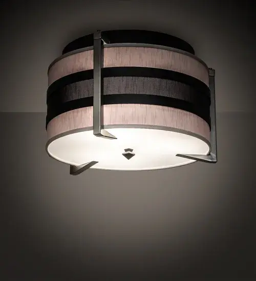 A stunning centerpiece to illuminate any residential or commercial decor. The Nathan ceiling luminaire features an Amsterdam Chalk Textrene shade with Textured Black solid bands surrounding a Weave-Tex band. This luminaire is enhanced with an architecturally styled frame and a Statuario Idalight bottom diffuser. The hardware is featured in a Brushed Nickel powder coat finish. This stunning ceiling fixture is perfect for placement in corridors and other areas in residential and hospitality settings from Newport; Rhode Island; to Boca Raton; Florida. The Nathan Flushmount is included in our American-made; American-designed; handcrafted Modern Lighting Collection and manufactured in Yorkville; New York. UL & cUL listed for dry and damp locations; however; we do not recommend installing it in spaces that experience a large amount of moisture due to the fabric shade.