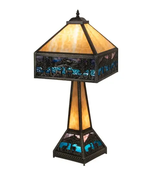 A magnificent table lamp to illuminate any interior decor. This Brass lamp features a Beige crown with a matching stem. The dramatic shade and matching base design feature Deer meandering near a Blue Green Ripple Glass lake below a Purple and Sky Blue art glass sky. Includes a 3-way switch to light the shade; base or both. Domestically Produced in our 180;000 square foot manufacturing facility in Yorkville; New York. Customize the shade colors; metal finishes and lamp sizes to meet your desires. UL and cUL listed for dry locations. The finish is Craftsman Brown. - alternate view