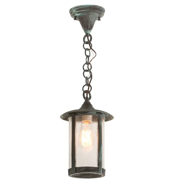 Handcrafted from Solid Brass with alluring rustic beauty. This stunning Craftsman Signature lantern features a Clear Seeded Glass lens enhanced with a Craftsman Verdigris finish. Display this pendant outdoors under a covered porch, entryway, or a three-season space within timber homes, modern farmhouses, and other locations. The overall height ranges from 18 to 25 inches, and the chain can be easily adjusted on location to meet your lighting requirements. The Fulton Prime Pendant is included in our American-made, American-designed, handcrafted Craftsman Signature Series, manufactured in Yorkville, New York. UL and cUL listed for dry and damp locations. Our Build Your Own Craftsman Signature Series features unlimited combinations of styles. The collection is called Build Your Own because it is fully configurable and customizable from size and design to finish and lens color. Marine grade, solid brass, or copper raw materials are utilized to ensure items from the Craftsman Signature Series of outdoor and indoor lighting will stand the test of time, as these premium metals are impervious to most types of oxidation. Hand-applied Patina finishes on brass and copper are sealed with a clear varnish and over time, may require gentle maintenance, such as wax, to delay or reverse the natural living finish attributes indicative of this finishing process. Patina finishes on brass and copper provide strong resistance to fading from sun exposure, will not chip or crack, and will not rust like a steel-framed item in the same conditions. Choose from many style options, or send us your concept today! Call today to learn how to use the configuration tool available on our website for an instant item number! Collection: Fulton Finish: Craftsman Verdigris Glass: Clear Seeded Glass Width: 8.00" Height: 18.00" Length: 8.00" Weight: 4.00 lb Number of Bulbs: 1 Maximum Wattage: 9.00 W Bulb Type: A19 Bulb Base: E26 Light Source: LED Material: Brass Country of Origin: USA Safety Listing: Damp Safety Rating: Wet LED