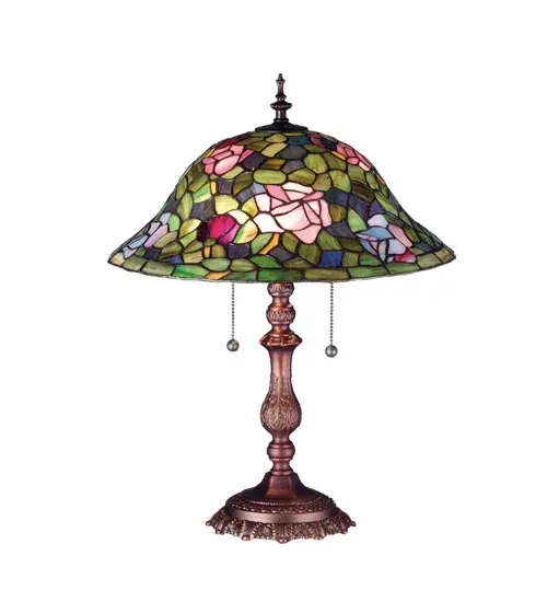 The most beloved of all floral beauties. The Rosebush is beautifully represented in this stunning reproduction of a Tiffany Studio Classic. Petal Pink; Romantic Red and Beautiful Blue art glass Roses ramble on a maze of Garden Green leaves. The luxurious shade is created using the famous Meyda Tiffany copperfoil construction. The delicate domed stained glass shade is paired with a Mahogany Bronze finished base to create a stunning table lamp. UL and cUL listed for dry locations.
