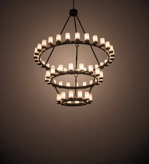 Blending an elegant style with a rich distinguished look; this Noziroh Chandelier features 3 Timeless Bronze steel rings that provide timeless beauty and impressive ambient illumination. A total of 60 Whitestone Idalight Cylindres are mounted on the structure; each perched on a bobeche. Overall height ranges from 117 to 417 inches as the chain can be easily adjusted in the field. The Noziroh Ring 60 Light Chandelier is included in our American-made; American-designed; handcrafted Gothic Collection and manufactured in Yorkville; New York. UL and cUL listed for dry and damp locations.
