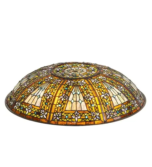 A Meyda original design inspired by castle and cathedral glass. This stained glass shade features purple tri petaled irises and azure colored jewels against bands of green and umber; surrounding a mottled blue; mauve; and peridot field. Created using the Meyda Tiffany copper foil construction process. Pairs with hardware to create pendants and other ceiling fixtures. Included in our American-designed; handcrafted Stained Glass Lighting Collection. - alternate view