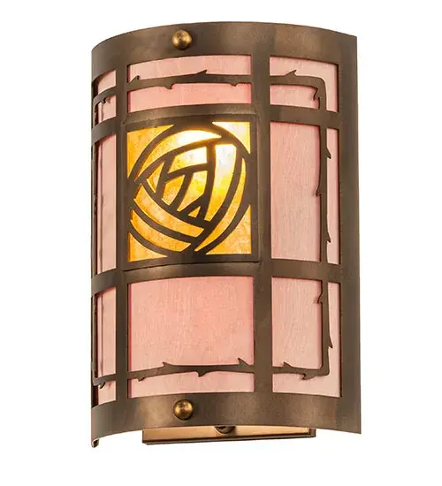 This handsome Bungalow Rose adorned mission wall sconce is handcrafted in the USA by Meyda artisans. The handsome fixture is finished in Antique Copper and has Birch bark and Amber mica panels. Collection: Bungalow Rose Finish: Antique Copper Glass: Amber Mica And Birchwood Width: 8.75" Height: 12.50" Length: 4.50" Weight: 4.00 lb Extension from Wall: 4.50" Number of Bulbs: 2 Maximum Wattage: 60.00 W Bulb Type: A19 Bulb Base: E26 Material: Steel Country of Origin: USA Safety Listing: Damp Safety Rating: Damp - alternate view