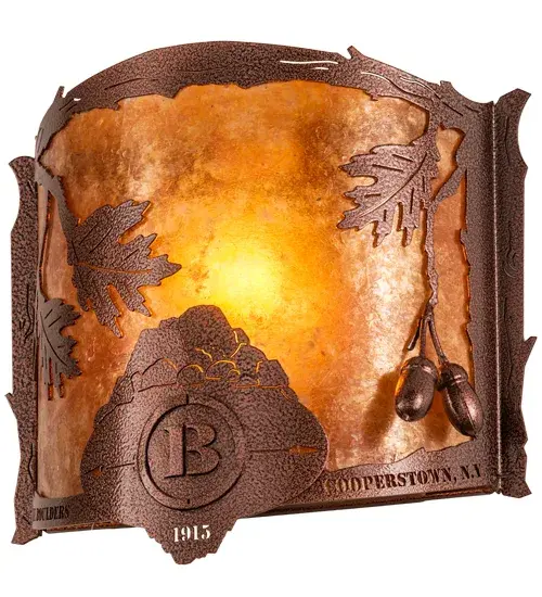 This alluring wall sconce features Copper Vein finished Oak Leaves that shine brilliantly on an Amber Mica background. This sconce is personalized with the laser-cut Boulders Cooperstown, NY name and Black hand-painted logo. The Boulders Personalized Wall Sconce is featured in our American made, American designed, handcrafted Boulders Personalized Lighting Collection. Manufactured in Yorkville, New York. UL and cUL listed for dry and damp locations.This personalized item is an example of our craftsmanship and custom capabilities. It is not for sale as is but can be customized with a business or family name to fit your personal needs. Collection: Boulders Finish: New Copper Vein Glass: Amber Mica Width: 11.50" Height: 10.50" Length: 4.25" Weight: 2.50 lb Extension from Wall: 4.25" Number of Bulbs: 1 Maximum Wattage: 60.00 W Bulb Type: A19 Bulb Base: E26 Light Source: LED Material: Steel Country of Origin: USA Safety Listing: Damp Safety Rating: Damp LED - alternate view