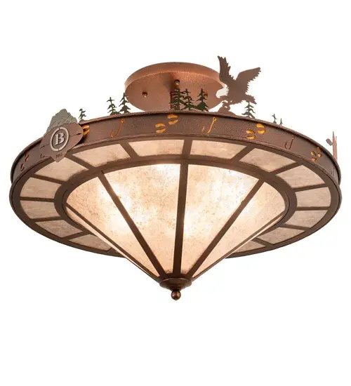 This Wildlife ceiling fixture features Custom Handpainted Tall Pine Trees; Eagle; Bass and a Fishermen above the shade. The fixture border includes deer track and fishhook motifs hand-etched over Amber Mica. The shade is highlighted with Silver Mica and enhanced with hardware in a New Copper Vein finish. The fixture is personalized with the laser-cut Boulders Cooperstown; NY name and Black handpainted logo. This personalized item is shown as an example of our craftsmanship and custom capabilities. It is not for sale as is but can be customized with your business logo or family name to fit your personal needs. - alternate view