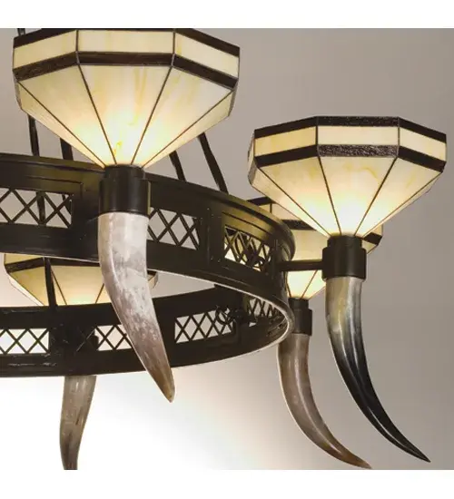The sophisticated Top Ridge eight light chandelier has Bone Beige shades with Rootbeer granite bands that set above genuine steer horns. The shades and horns circle a diamond accented ring that is suspended from forged arms. All metal parts are hand crafted in the USA by Meyda artisans and are finished in Timeless Bronze. - alternate view
