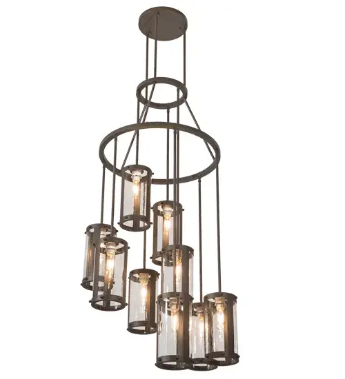 Spanning up to more than 6 feet from top to bottom, this two-tiered chandelier renders an eye-catching transitional look. Beautiful Clear Antique Window Glass shades are aligned in a staggered formation, suspended from two decorative rings and a canopy while providing light at various levels. All hardware is hand-finished in Oil Rubbed Bronze while an inviting glow evokes from 9 decorative cylinders. Ideal for illuminating entryways, lobbies, foyers, ballrooms and other residential, hospitality and commercial spaces. The Cartier Cascading Chandelier is featured in our American-made, American-designed, handcrafted Transitional Lighting Collection. UL and cUL listed for dry and damp locations. Collection: Cartier Finish: Oil Rubbed Bronze Glass: Clear Antique Window Glass Width: 30.00" Height: 80.00" Length: 30.00" Weight: 60.00 lb Number of Bulbs: 9 Maximum Wattage: 60.00 W Bulb Type: T10 Bulb Base: E26 Material: Steel Country of Origin: USA Safety Listing: Damp Safety Rating: Damp - alternate view