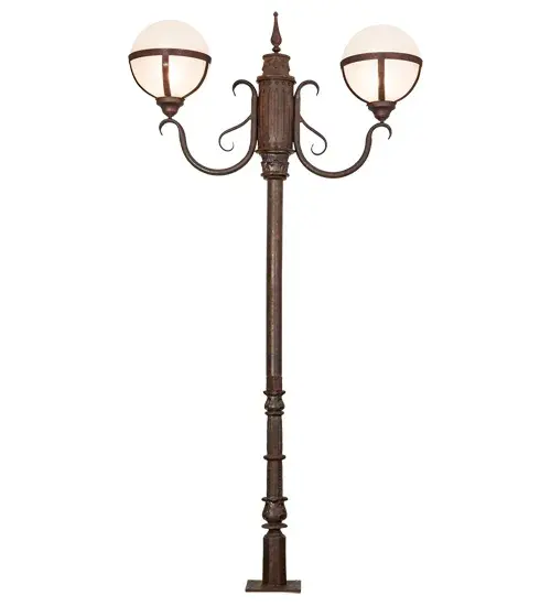 Bola Tavern creates dramatic visual interest with sophistication, romance and elegance. This indoor/outdoor Cast Iron street lamp features two Contrail Mist Idalight orb diffusers cradled with deco accents and complemented with a Rusty Nail finish. This floor lamp custom mounts directly to the ground surface. Handcrafted by highly skilled artisans in our 180,000 square foot manufacturing facility in Yorkville, New York. Lens colors and materials, metal finishes and sizes can be customized to meet your needs. UL and cUL listed for dry, damp and wet locations. Designed by Karen Hanlon. Collection: Bola Finish: Rusty Nail Glass: Contrail Mist Idalight Width: 42.50" Height: 84.00" Length: 12.00" Weight: 73.50 lb Extension from Wall: 12.50" Number of Bulbs: 2 Maximum Wattage: 60.00 W Bulb Type: A19 Bulb Base: E26 Material: Cast Iron/Steel Country of Origin: USA Safety Listing: Wet Safety Rating: Wet - alternate view