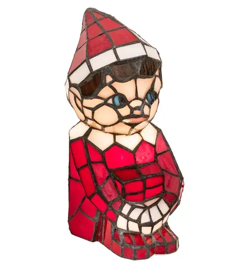 Warm your heart and imagine Santa's Helper on your shelf or over the mantle. A charming lighted Tiffany styled sculpture; Santa's Helper comes to light as a colorful accent lamp. The Elf is adorned in an exquisite outfit featured in Red art glass with White glass trim. Facial features include Blue glass eyes and other complementary attributes. Handcrafted of individual pieces of stained glass using the famous Meyda Tiffany copperfoil construction process. UL and cUL listed for dry and damp locations. - alternate view