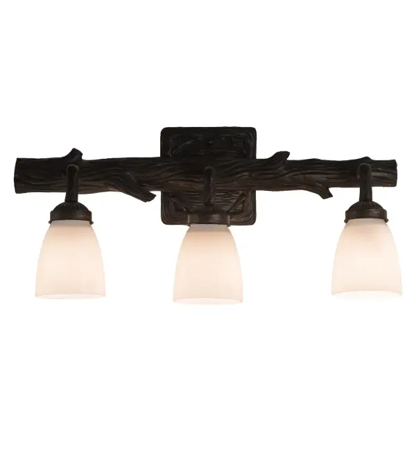 Capturing the look and feel of the American woodlands, this nature-inspired wall luminaire features a bark-like backplate with branch-like arms in a textured Golden Pine finish. The decorative hardware is complemented with three White Opal Glass Goblet shades. The fixture is ideal as a vanity in a fine bath or as a wall sconce in a hallway or another space. The 22-inch wide fixture is UL and cUL listed for dry and damp locations. Collection: Northwoods Pine Finish: Timeless Bronze Glass: White Opal Glass Width: 22.00" Height: 9.00" Length: 7.00" Weight: 5.00 lb Extension from Wall: 7.00" Number of Bulbs: 3 Maximum Wattage: 60.00 W Bulb Type: A19 Bulb Base: E26 Material: Resin Country of Origin: CHINA Safety Listing: Damp Safety Rating: Damp
