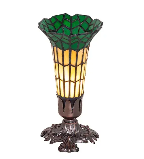 Inspired by the famous Tiffany design from the early 1900s. This mini lamp features a stunning Green and Amber art glass shade which was created using the famous Meyda Tiffany copperfoil construction technique. The Pond Lily shade is embraced by an elegant Victorian cast metal base finished by hand in Mahogany Bronze. The Pond Lily Mini Lamp is featured in our American designed, handcrafted Stained Glass Lighting Collection. UL and cUL listed for dry locations. Each shade is a unique work of art with color variations based on natural ingredients inherent in the glass. Contact us if color matching is critical when ordering multiple items. Collection: Stained Glass Pond Lily Finish: Mahogany Bronze Glass: Honey Wispy/Kelly Green Width: 4.00" Height: 8.00" Length: 4.00" Weight: 2.00 lb Number of Bulbs: 1 Maximum Wattage: 40.00 W Bulb Type: B10 Bulb Base: E12 Material: Zinc Country of Origin: CHINA Safety Rating: Dry - alternate view