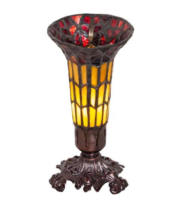 Inspired by Tiffany's famous Pond Lily design from the early 1900s... This mini lamp is created with Red and Amber art glass using the famous Meyda Tiffany copperfoil construction. The Pond Lily shade is embraced by an elegant Victorian cast metal footed base finished by hand in Mahogany Bronze. The Pond Lily Accent Lamp is featured in our American designed, handcrafted Stained Glass Lighting Collection. UL and cUL listed for dry locations. Each shade is a unique work of art with color variations based on natural ingredients inherent in the glass. Contact us if color matching is critical when ordering multiple items. Collection: Stained Glass Pond Lily Finish: Mahogany Bronze Glass: Honey Wispy & Red Width: 4.00" Height: 8.00" Length: 4.00" Weight: 2.00 lb Number of Bulbs: 1 Maximum Wattage: 60.00 W Bulb Type: B10 Bulb Base: E12 Material: Zinc Country of Origin: CHINA Safety Rating: Dry