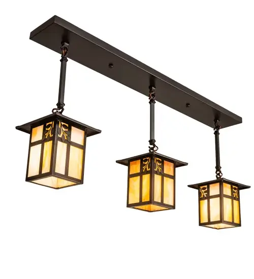 feature a single Branch Leaf filigree accent for illuminating kitchen islands; counters; tables and Handcrafted from Solid Brass. The three lanterns highlighted on Beige Iridescent glass and enhanced with a Craftsman Brown finish. The pendant is ideal for illuminating kitchen islands; counters; tables and bars. This Craftsman Signature fixture is Made to Order in our 180;000 sq ft manufacturing facility in Yorkville; NY at the foothills of the Adirondack Mountains. This fully configurable Build Your Own series offers unlimited combinations of lantern styles; functions; fixture sizes and metal finishes. UL and cUL listed for dry and damp locations. - alternate view