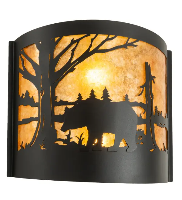 Drawing inspiration from the wildlife and natural beauty in the nearby Adirondack Mountains. A Majestic Bear wanders near this woodland lake while surrounded by Pine Tree silhouettes. The curvaceous shade features an Amber Mica lens complemented with a Textured Black finish. Ideal for illuminating hallways and dining areas in residential and hospitality settings; from Rockland; Maine; to Eden Prairie; Minnesota; to Eugene; Oregon. The Bear at Lake Wall Sconce is featured in our American-made; American-designed; handcrafted Wildlife Lighting Collection. Manufactured in Yorkville; New York. UL and cUL listed for dry and damp locations.