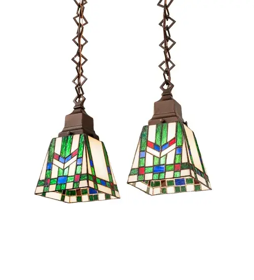 In the tradition of the Prairie School; organic objects were interpreted into geometric forms. In each shade; interlocking blocks of Willow Green; Chili Red and Azure Blue form stylized wheat stalks on a Beige Cream background. The art glass shades are created with the famous Meyda Tiffany copperfoil construction and enhanced with a Mahogany Bronze finish. Overall height ranges from 11 to 46 inches as chains easily adjust in the field. The Prairie Wheat Pendant is included in our American-designed; handcrafted Prairie Lighting Collection. UL and cUL listed for dry and damp locations. Each shade is a unique work of art with color variations based on natural ingredients inherent in the glass. Contact us if color matching is critical when ordering multiple items. - alternate view