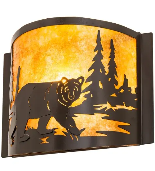 A Black Bear wanders by a lake in the woods on this nature-inspired wall sconce. The stunning fixture features a Timeless Bronze finish with Amber Mica panel diffusers. This ADA Compliant wall sconce is ideal for illuminating walls in corridors and rooms in residential, hospitality, and commercial spaces. The Bear at Lake Wall Sconce is included in our American-made, American-designed, handcrafted Wildlife Lighting Collection. Manufactured in Yorkville, New York. UL and cUL listed for dry and damp locations. Collection: Bear At Lake Finish: Timeless Bronze Glass: Amber Mica Width: 12.00" Height: 9.25" Length: 4.00" Weight: 3.00 lb Extension from Wall: 4.00" Number of Bulbs: 1 Maximum Wattage: 60.00 W Bulb Type: A19 Bulb Base: E26 Material: Steel Country of Origin: USA Safety Listing: Damp Safety Rating: Damp - alternate view