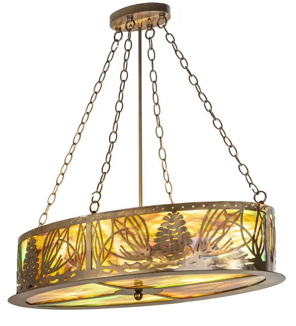 Mother nature comes to light. Mountain Pine-cones and Pine Needles are featured on this unique nature inspired oblong inverted ceiling pendant. The charm of the forest comes alive with soft ambient light emanating through beautiful Multicolored art glass. The shade is accented with hardware and accents featured in an Antique Copper finish. The fixture is perfect above tables; islands; counters and wherever you want to make a stunning design statement. Handcrafted by highly skilled artisans in our 180;000 square foot manufacturing facility in Yorkville; NY; at the foothills of the Adirondack Mountains. Custom sizes; diffuser colors and finishes are available. UL and cUL listed for dry and damp locations.