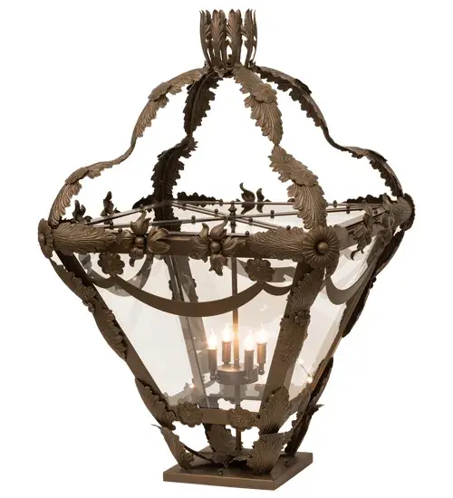 This exquisitely ornament lantern features a delicate array of Acanthus leaves; floral accents and Handforged Iron scrolls in a Brown Metallic finish. The Clear Glass lens reveals a complementary four light faux candelabra that provides beautiful ambient illumination. This elegant pier mount is crafted of solid steel and ideal for indoor and outdoor lighting applications. The Symone can be mounted directly on to decks; piers and columns. Custom crafted by highly skilled artisans in our 180;000 square foot manufacturing facility in Yorkville; New York. Custom sizes; diffuser colors and finishes are available. UL and cUL listed for dry; damp and wet locations. - alternate view