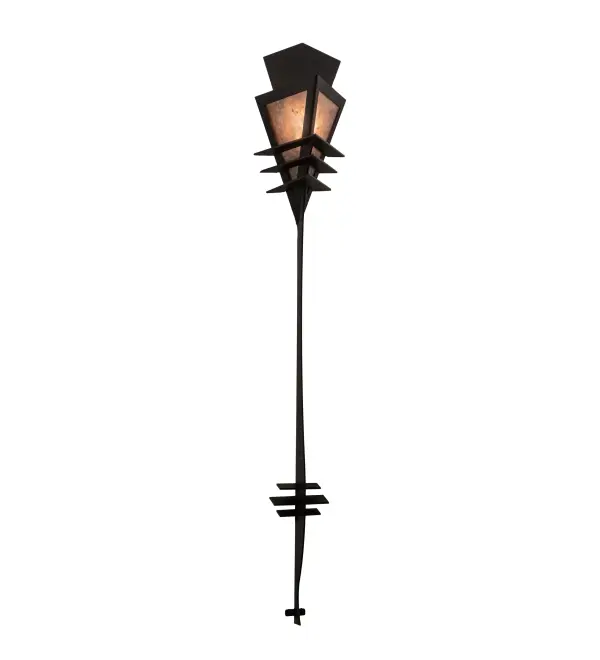 An intriguing tribal motif is updated with contemporary styling and materials. Zaira is defined with a stunning diamond shaped diffuser in warm Silver Mica. The dramatically designed shade is highlighted with piercing arrowhead metal accents and a long stylish finial featured in a Blackwash finish. Beautiful ambient lighting washes the wall behind any room in a fine home; hotel; or commercial space from Paterson; New Jersey; to Syracuse; New York; to Naperville; Illinois. It is ideal for illuminating hallways and entryways in homes and restaurants from Memphis; Tennessee; to Detroit; Michigan; to Honolulu; Hawaii. The Zaira Wall Sconce is featured in our American-made; American-designed; handcrafted Craftsman Lighting Collection. The fixture is manufactured in Yorkville; New York. It is UL and cUL listed for dry and damp locations.