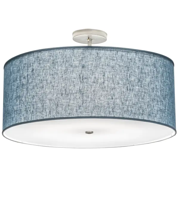 Offering a refined architectural look that will complement the most luxurious interiors; this Cilindro ceiling fixture creates soft illumination and sophistication with an elegant material palette. The Blue Textrene shade is complemented with a Statuario Idalight bottom diffuser and enhanced with Nickel and White finishes. The Cilindro Textrene Semi-Flushmount is featured in our American-made; American-designed; handcrafted Modern Collection. UL and cUL listed for dry and damp locations; however; we do not recommend placing it in spaces that experience a large amount of moisture due to the fabric shade. This fixture is featured at Cedarbrook of Rochester; a senior living community in Rochester; Michigan.