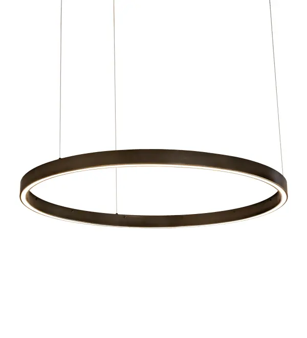 A modern sophisticated pendant featuring a spectral halo of ambient light that creates a stunning visual effect and breathtaking drama. Eliminating the power cord; our exclusive proprietary suspension system is engineered with low voltage spacecraft cables for balance; precision and a clean aesthetic. This Bronze finished solid ring reveals a Statuario Idalight diffuser. Integral LEDs deliver dimmability; energy savings; minimal maintenance and long life. The overall height of this pendant ranges from 4 to 74 inches as the cable length can be easily adjusted in the field to accommodate your specific lighting application needs. Diffuser colors; metal finishes and fixture sizes can be customized to your needs.