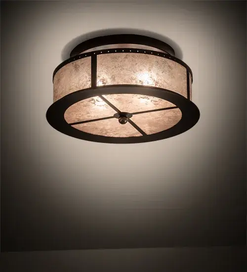 Inspired by the famed Arts and Crafts movement in design. This handsome ceiling fixture provides beautiful ambient light gently projected from a stunning Silver Mica shade. The stunning ceiling fixture is enhanced with a Mahogany Bronze finished Saltire design and accents. The Smythe Craftsman Flushmount is featured in our American-made; American-designed; handcrafted Arts & Crafts Lighting Collection. Manufactured in Yorkville; New York. UL and cUL listed for dry and damp locations.