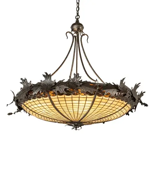 Majestic as the mighty oak; this dramatically styled pendant features an Acorn art glass profile. The stained glass shade delights with Autumnal Beige Art glass; featuring a Bark Brown Glass crown; sprouting Golden Bronze finished Oak leaf metal accents and hardware. The shade is created using the famous Meyda Tiffany copper foil construction process. The pendant is ideal for installation above a kitchen island or dining table; creating a beautiful design statement. The overall height ranges from 41 to 71 inches; as the chain can be easily adjusted on location. The Greenbriar Oak Inverted Pendant is part of our American-made; American-designed; handcrafted Greenbriar Collection. The fixture is UL and cUL listed for dry & damp locations. Each shade is a unique work of art; featuring color variations derived from the natural ingredients inherent in the glass. Please don't hesitate to contact us if color matching is critical when ordering multiple items. - alternate view