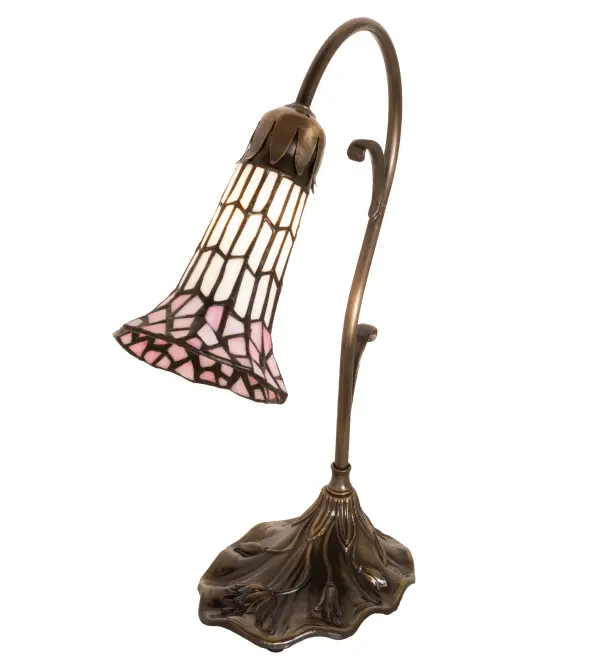 Inspired by the popular Tiffany design from the early 1900s... This mini lamp offers an attractive, delicate design featuring a stunning shade in Pink and White created with the famous Meyda Tiffany copperfoil construction. The Pond Lily shade is embraced by an elegant cast base that is finished by hand in Antique Brass. The Pond Lily Mini Lamp is featured in our American designed, handcrafted Stained Glass Lighting Collection. Each shade is a unique work of art with color variations based on natural ingredients inherent in the glass. Contact us if color matching is critical when ordering multiple items. Collection: Stained Glass Pond Lily Finish: Antique Brass Glass: Pink/White Width: 7.00" Height: 15.00" Length: 7.00" Weight: 3.50 lb Number of Bulbs: 1 Maximum Wattage: 40.00 W Bulb Type: B10 Bulb Base: E12 Material: Zinc Country of Origin: CHINA Safety Rating: Dry