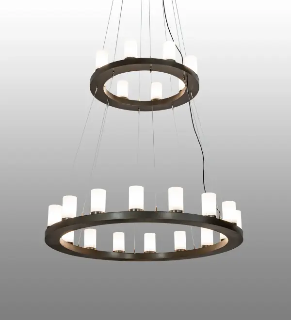 Blending an elegant style with a classic; distinguished look... This massive Loxley chandelier is custom-crafted with 24 Statuario Idalight Cylindres; providing beautiful ambient lighting. These illuminating elements are perched on two sturdy rings; enhanced with an English Brown finish. The luxurious custom-crafted fixture is ideal for illuminating ballrooms; dining areas; lobbies; entryways; and other residential; hospitality; and commercial spaces. The overall height ranges from 28 to 138 inches; as the aircraft cable can be easily adjusted on location to meet your specific requirements. The Loxley 24 Light Chandelier is part of our American-made; American-designed; handcrafted Loxley Lighting Collection. This fixture is manufactured in Yorkville; New York; and is UL and cUL listed for dry and damp locations. The Loxley Collection features various chandeliers; pendants; and wall sconces designed with sturdy rings accented with faux candlelights or cylindrical elements. Many of these fixtures make great statement pieces for large spaces and can be customized with your choice of size; finish; and lamping.