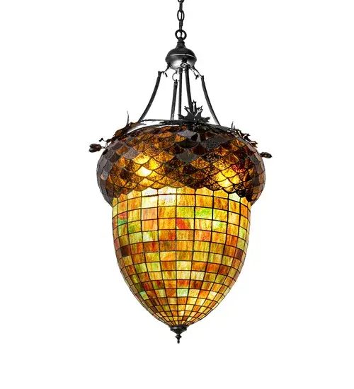 This stunning ceiling pendant is as majestic as the mighty oak. The stained glass shade delights with Multi-Toned Autumn Green Art glass and a Bark Brown Granite Textured Glass crown sprouting Textured Black Oak leaf-covered hardware that is handmade by Meyda artisans. The shade is created using the famous Meyda Tiffany copperfoil construction process and includes a Crystal Idalight top diffuser. The overall height ranges from 46 to 58 inches as the chain easily adjusts in the field. The Greenbriar Oak Pendant is included in our American-designed, handcrafted Greenbriar Collection. UL and cUL listed for dry and damp locations. No two art glass shades will be the same, their individuality can be as remarkably unique as their personality. Collection: Greenbriar Oak Finish: Textured Black Glass: Stained Glass And Crystal Idalight Width: 22.00" Height: 46.00" Length: 22.00" Weight: 28.00 lb Number of Bulbs: 3 Maximum Wattage: 12.00 W Bulb Type: A19 Bulb Base: GU24 Light Source: LED Material: Steel Country of Origin: USA Safety Listing: Damp Safety Rating: Damp LED - alternate view