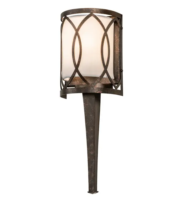 This stunning fixture with a chic curved design features an Art Deco motif. The Cream Textrene diffuser is complemented with a Gilded Tobacco finish. This ADA Compliant wall sconce is handcrafted by highly skilled artisans in our 180,000 square foot manufacturing facility in Yorkville, New York. Shade styles, metal finishes and sconce sizes can be customized. UL and cUL listed for dry and damp locations however we do not recommend installing it in spaces that experience moisture due to the fabric shade. Collection: Ashville Finish: Gilded Tobacco Glass: Laura Cream Textrene Width: 6.00" Height: 19.00" Length: 4.00" Weight: 3.00 lb Extension from Wall: 4.00" Number of Bulbs: 1 Maximum Wattage: 40.00 W Bulb Type: B11 Bulb Base: E26 Material: Steel Country of Origin: USA Safety Listing: Damp Safety Rating: Damp